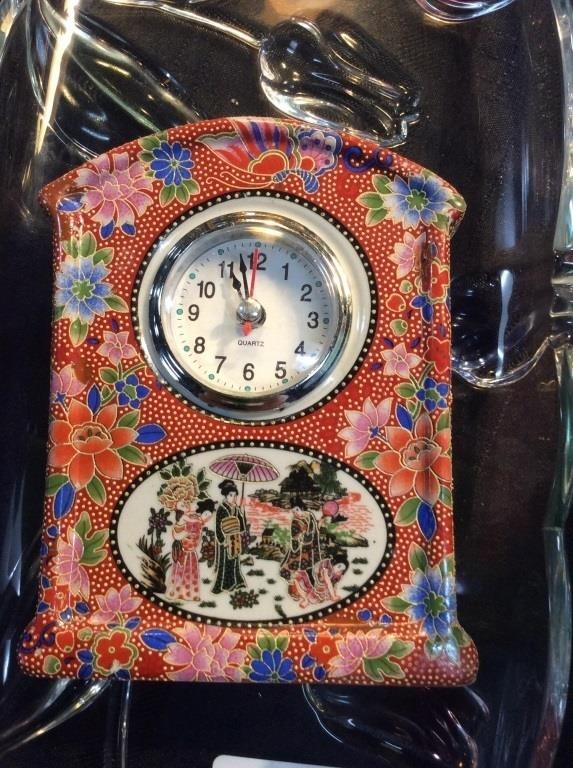 Asian decorated clock