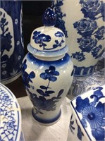 Blue and white covered jar