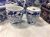 Two piece blue and white bathroom accessories