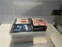 ASSORTED DVDs IN PLASTIC CONTAINER
