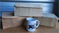 Three Boxes of John Deere Coffee Mugs