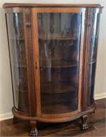 ANTIQUE CLAW FT. OAK 3 CURVED GLASS CHINA CAB.