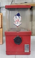 Old red penny gum ball machine