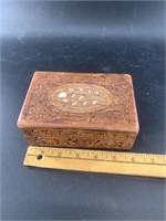 Hand carved lidded jewelry box with bone inlay and