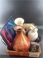 Assorted urns, book on Northern Lights, Whiskey cr