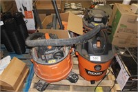 skid of 4 used ridgid shop vacs