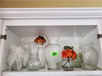 Shelf of floral vases
