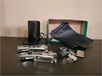 Lamp, staplers, money bags, magnet clips