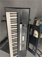 Yamaha Digital keyboard with stand and soft sided