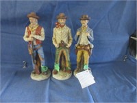 three ceramic western cowboys