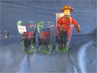 RCMP juice glasses and doll .