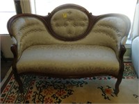 Victorian Rococo loveseat with green upholstery
