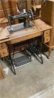 Singer sewing machine with sewing table