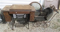 Singer sewing machine, antique stroller, round