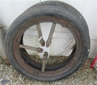 (2) Vintage tires, one with rim. Includes Ward's