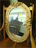 TOC oval gilt wall mirror