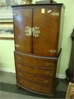 Bowfront mahogany highboy chest with brass Asian