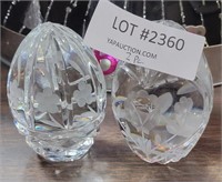 2 EGG-SHAPED FLORAL-THEMED GLASS PAPERWEIGHTS