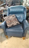 Blue leather recliner chair.