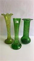 Trio of antique green glass vases