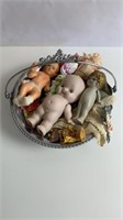 Bisque dolls, trinkets in silverplate bowl