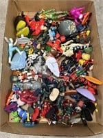 Assortment of action figures and other toys