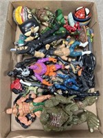Assortment of action figures, some are marked
