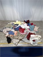 Assortment of handmade doll clothes