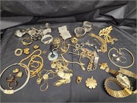 Costume jewelry bracelets. Earrings,  belts.   No