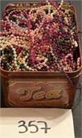 Vtg tea tin w/ mixed beads
