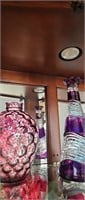 Items on top shelf of China Cabinet