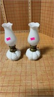 Two small oil lamps