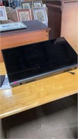 VIZIO 31" flat screen TV, with wall mount and