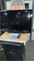 Toshiba, 31 inch flatscreen TV with remote and