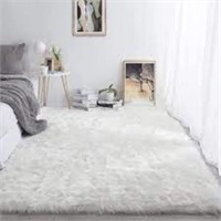 White Faux Fur Carpet. Approx. 8ft 9" x 6ft 4"