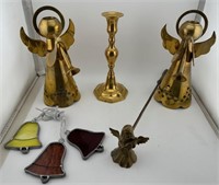 Brass angels and candle snuff