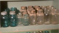 Shelf Of Vintage Blue & Clear Mason Jars