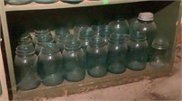 Shelf Of Antique Blue Mason Jars