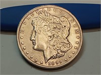 OF) 1891 silver Morgan dollar