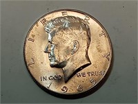 OF) Uncirculated 1965 silver Kennedy half dollar