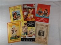 C7) 6 vintage advertising almanac / cook books.