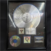 Mötley Crüe record award signed