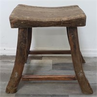 Antique hand-hewn wooden stool