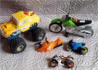 Toy lot. Big truck & motorcycles. Think outside