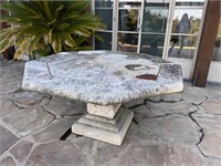 Octogonal stone table with stone base