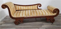 Antique chaise lounge on casters