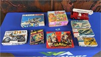 GROUP OF BOXED VINTAGE PUZZLES AND MODEL KITS