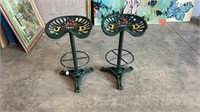 PAIR OF CAST IRON JOHN DEERE TRACTOR SEAT