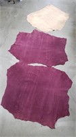 Bundle of three leather hides