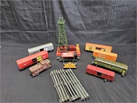 Group of vintage train cars, tracks & misc.